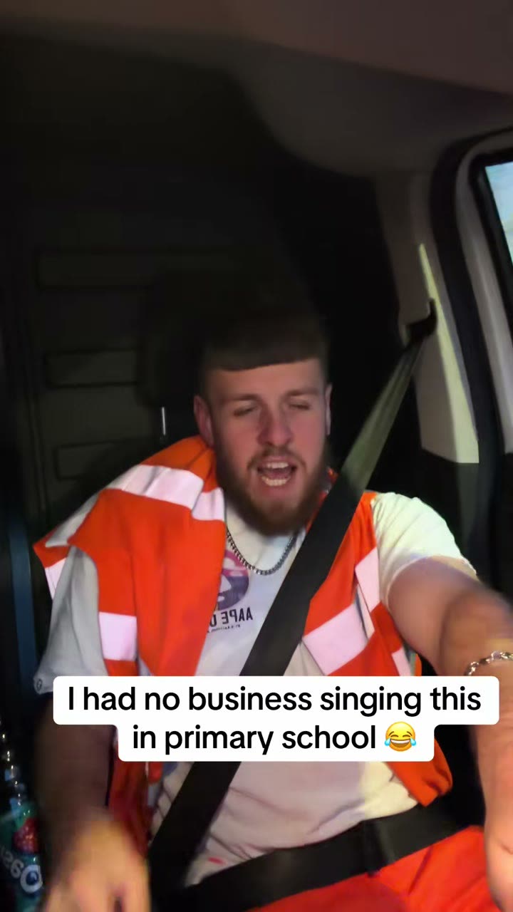 Original video: a man in an orange safety vest singing in the same van seat